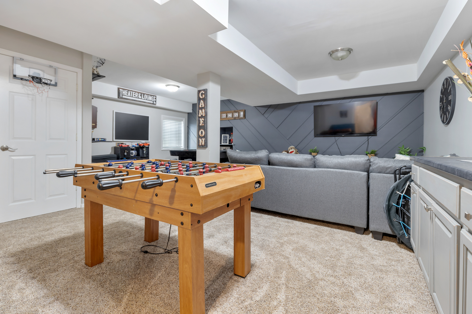 1016 Inverness Drive Antioch, IL 60002 - Photo 20 of 24 a room with table chairs and flat screen tv