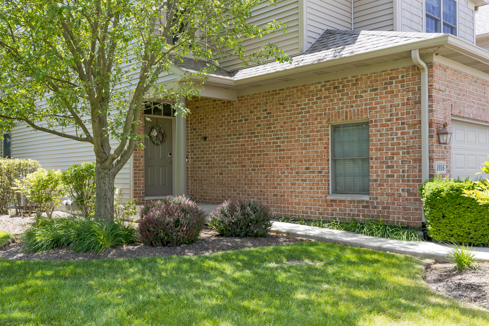 1016 Inverness Drive Antioch, IL 60002 - Photo 2 of 24 a backyard of a house with lots of green space