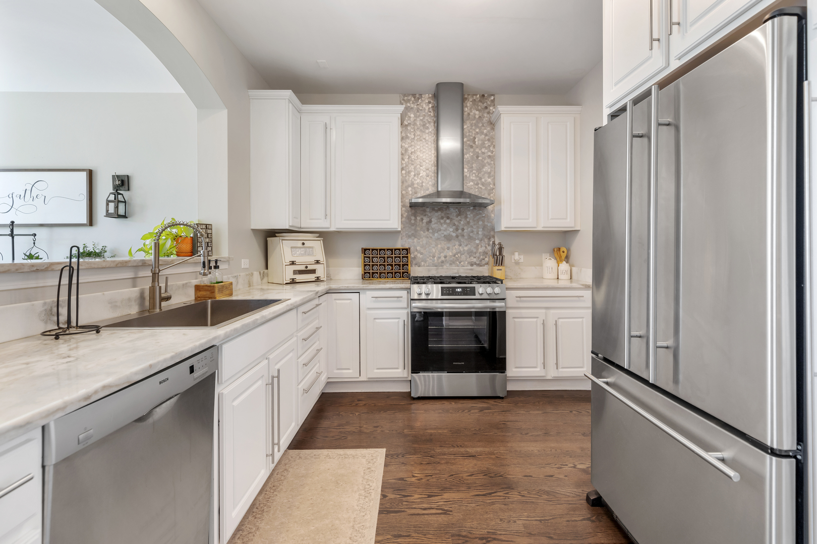 1016 Inverness Drive Antioch, IL 60002 - Photo 5 of 24 a kitchen with a sink stove and refrigerator