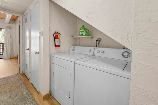 a utility room with dryer and washer