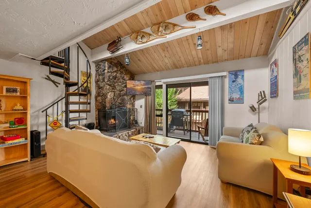 a bed room with a bed and a chair