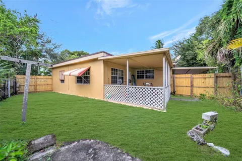 a view of a backyard with a garden