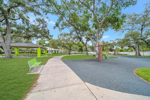 a view of a park with tree s