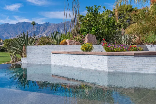 a view of a house with a swimming pool