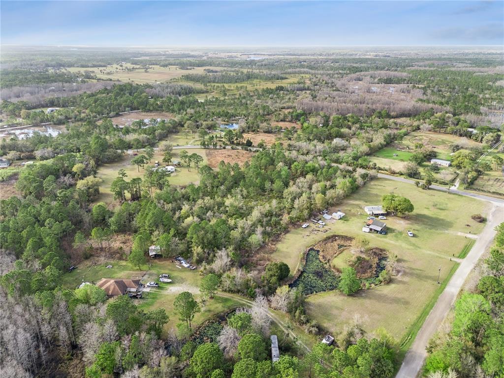 541 East Osceola Road Geneva, FL 32732 - Photo 31 of 31 an aerial view of residential houses with outdoor space