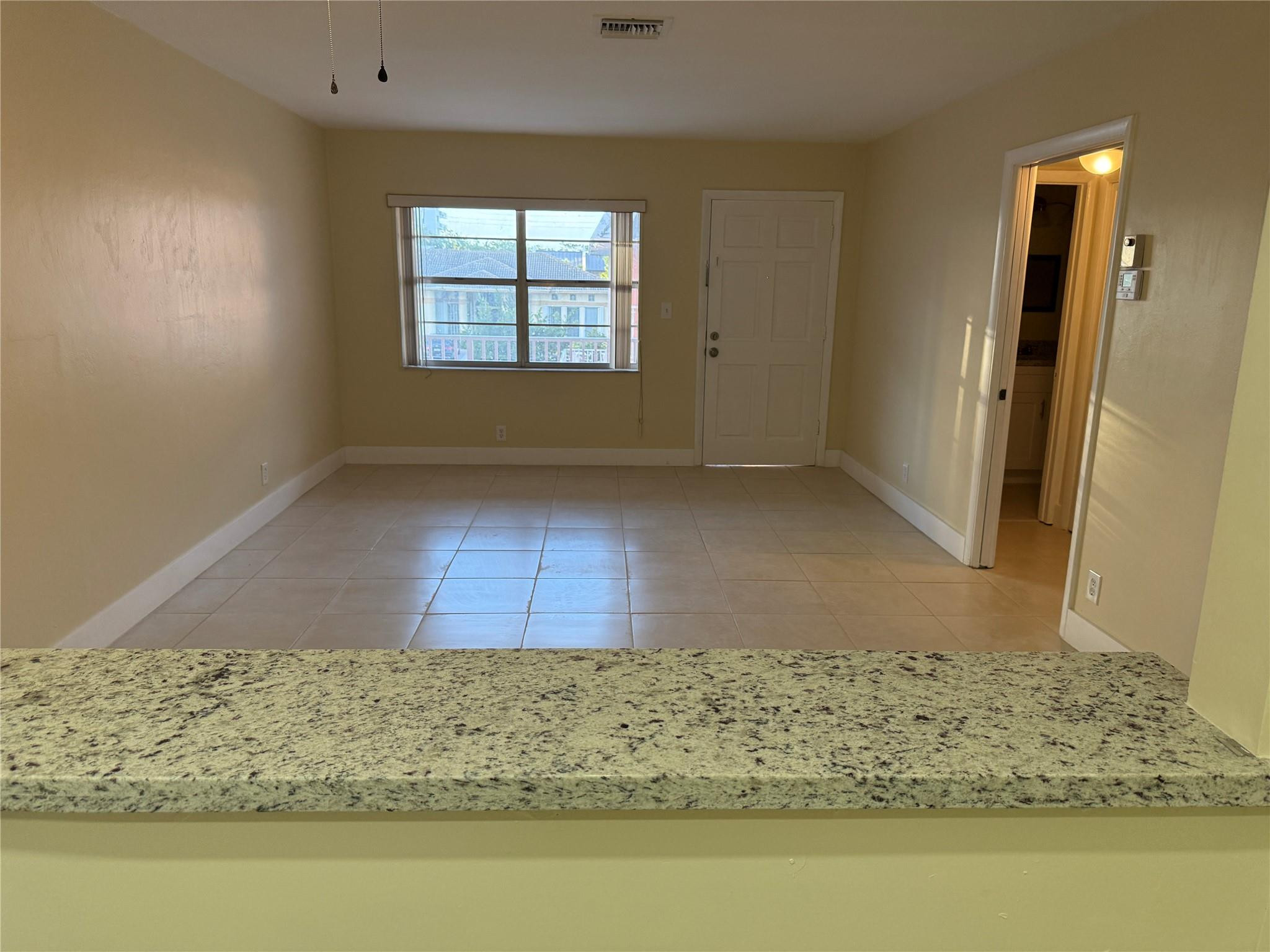 1450 North Riverside Drive, Unit 204 Pompano Beach, FL 33062 - Photo 6 of 10 Kitchen view Living Room