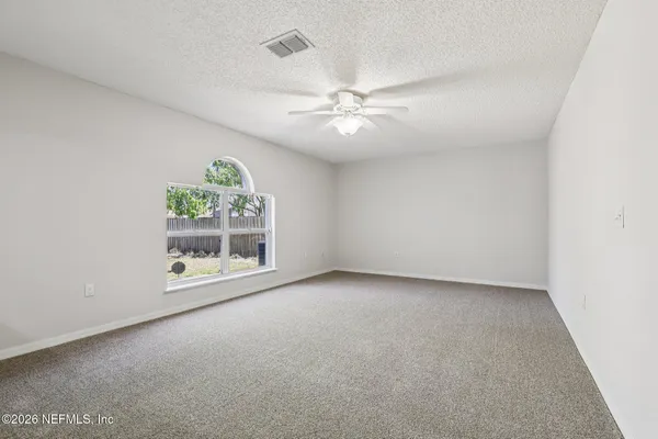 a kitchen that has a sink and a stove
