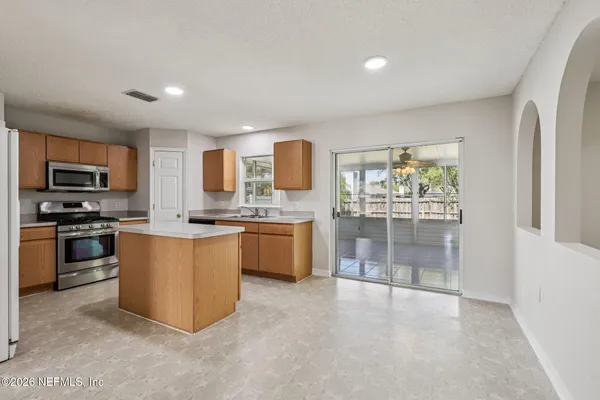 a view of a room with a fan