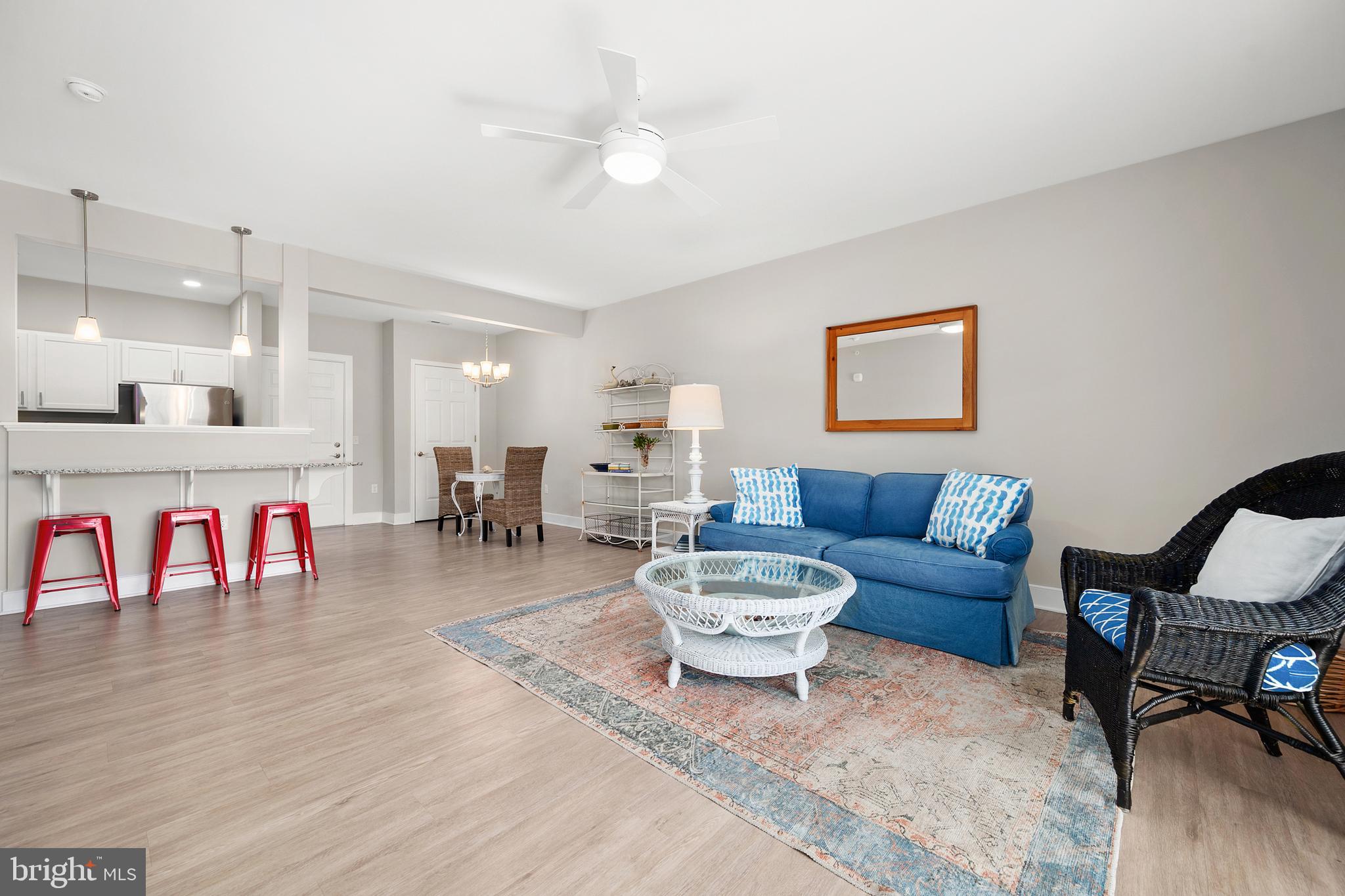30609 Cedar Neck Road, Unit 3108 Ocean View, DE 19970 - Photo 10 of 42 a living room with furniture and a table