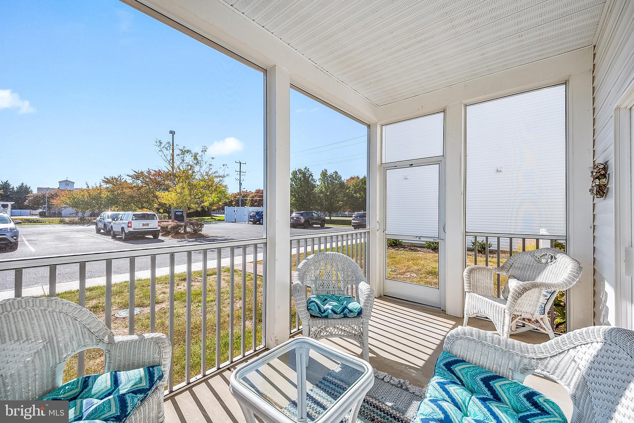 30609 Cedar Neck Road, Unit 3108 Ocean View, DE 19970 - Photo 31 of 42 a balcony with furniture and garden view