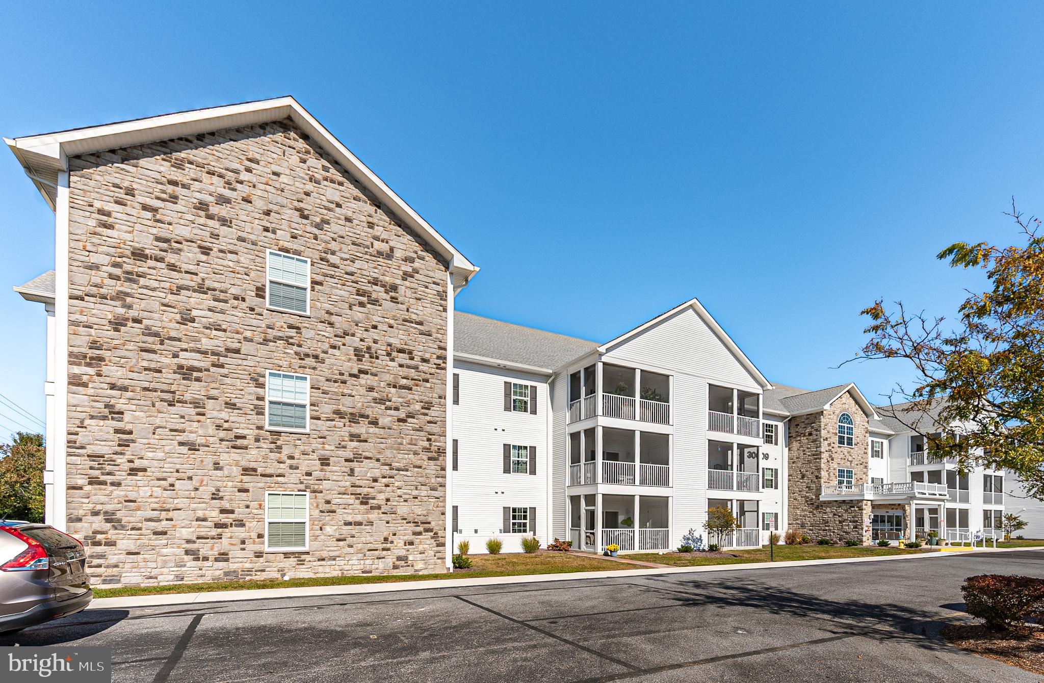 30609 Cedar Neck Road, Unit 3108 Ocean View, DE 19970 - Photo 33 of 42 a front view of a building