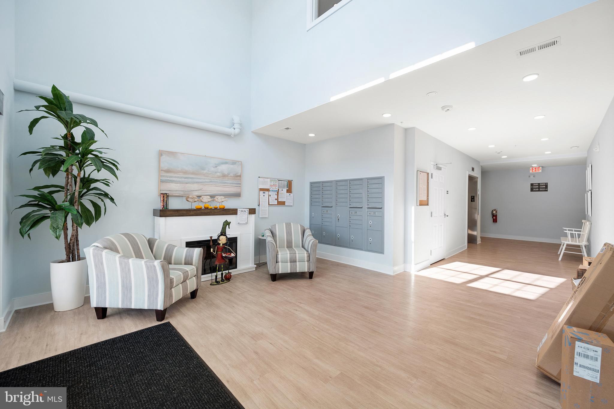 30609 Cedar Neck Road, Unit 3108 Ocean View, DE 19970 - Photo 36 of 42 a view of livingroom with furniture and a potted plant