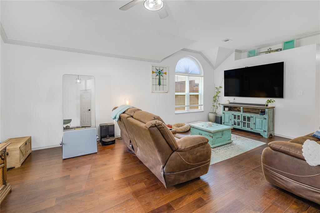 2813 Ridgemere Drive Flower Mound, TX 75028 - Photo 2 of 18 a living room with furniture and a flat screen tv
