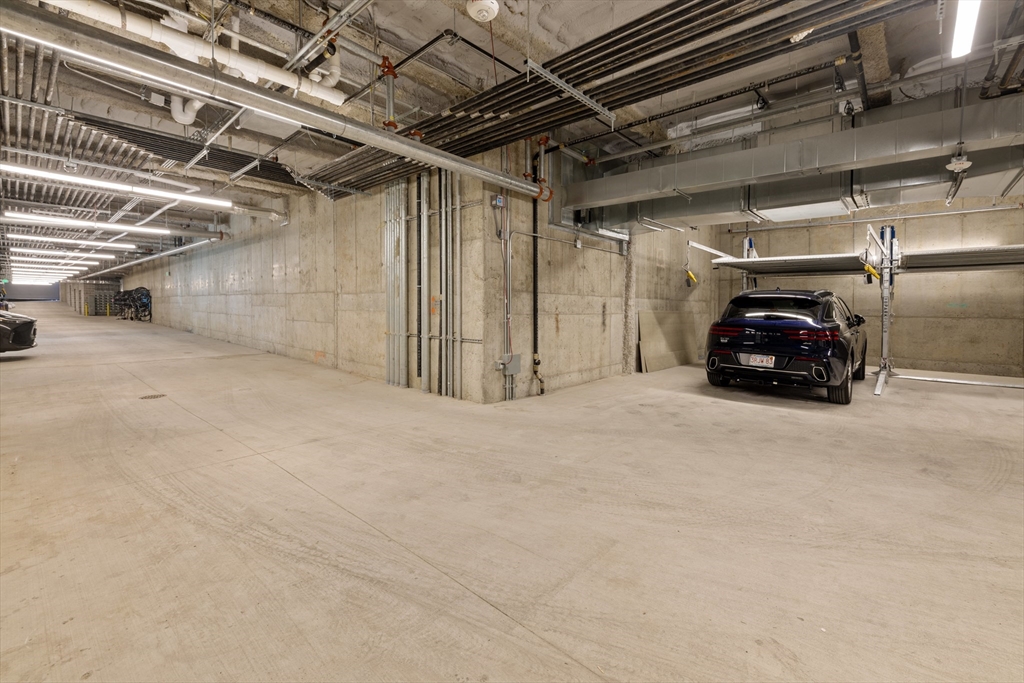 301 Border Street, Unit 611 Boston, MA 02128 - Photo 27 of 32 a car parked in garage
