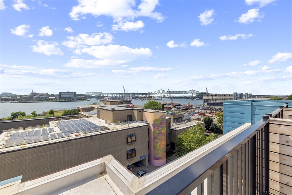 301 Border Street, Unit 611 Boston, MA 02128 - Photo 4 of 32 a view of a city from a balcony