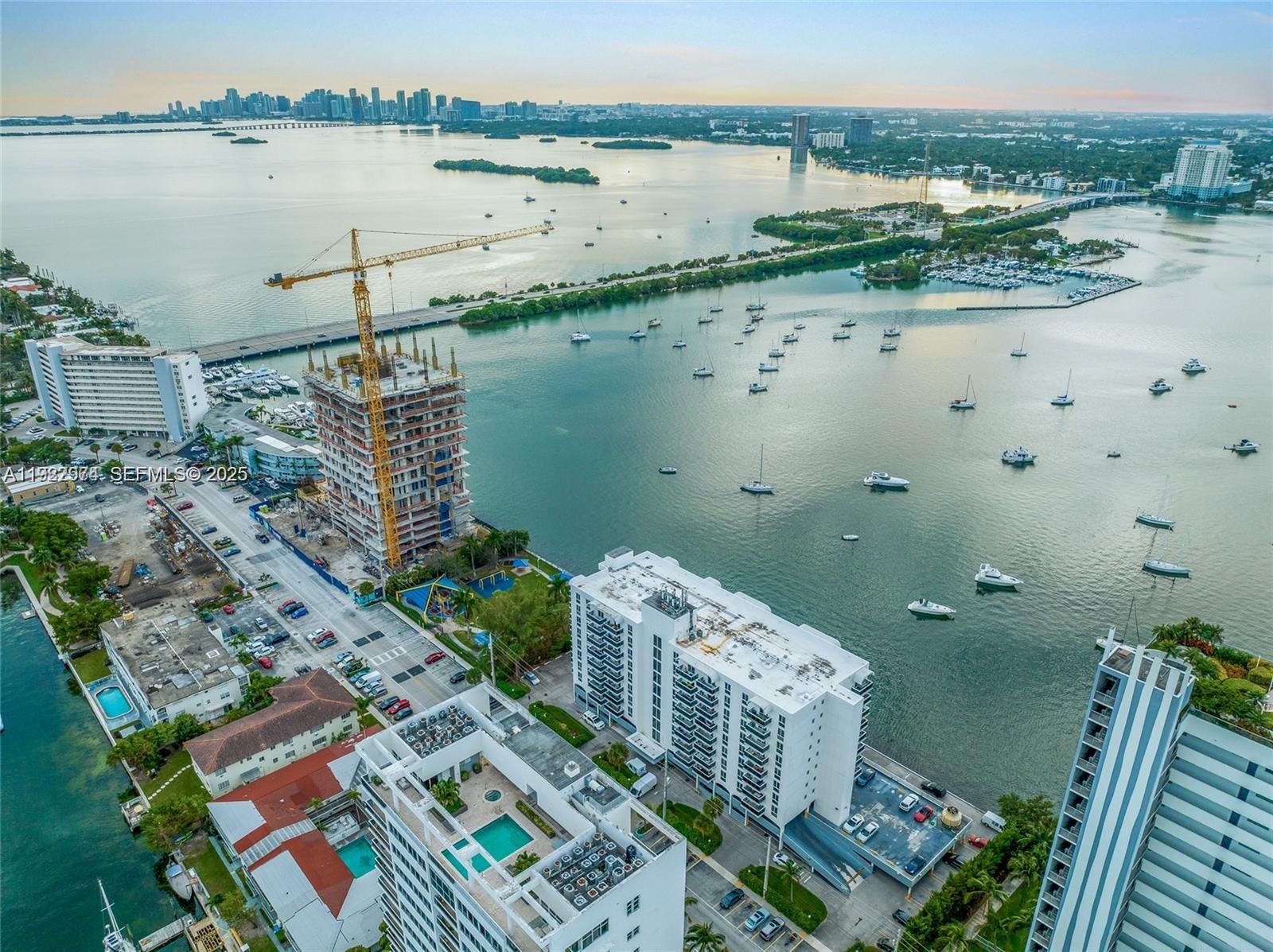 7928 West Drive, Unit 602 North Bay Village, FL 33141 - Photo 2 of 44 a view of lake with city