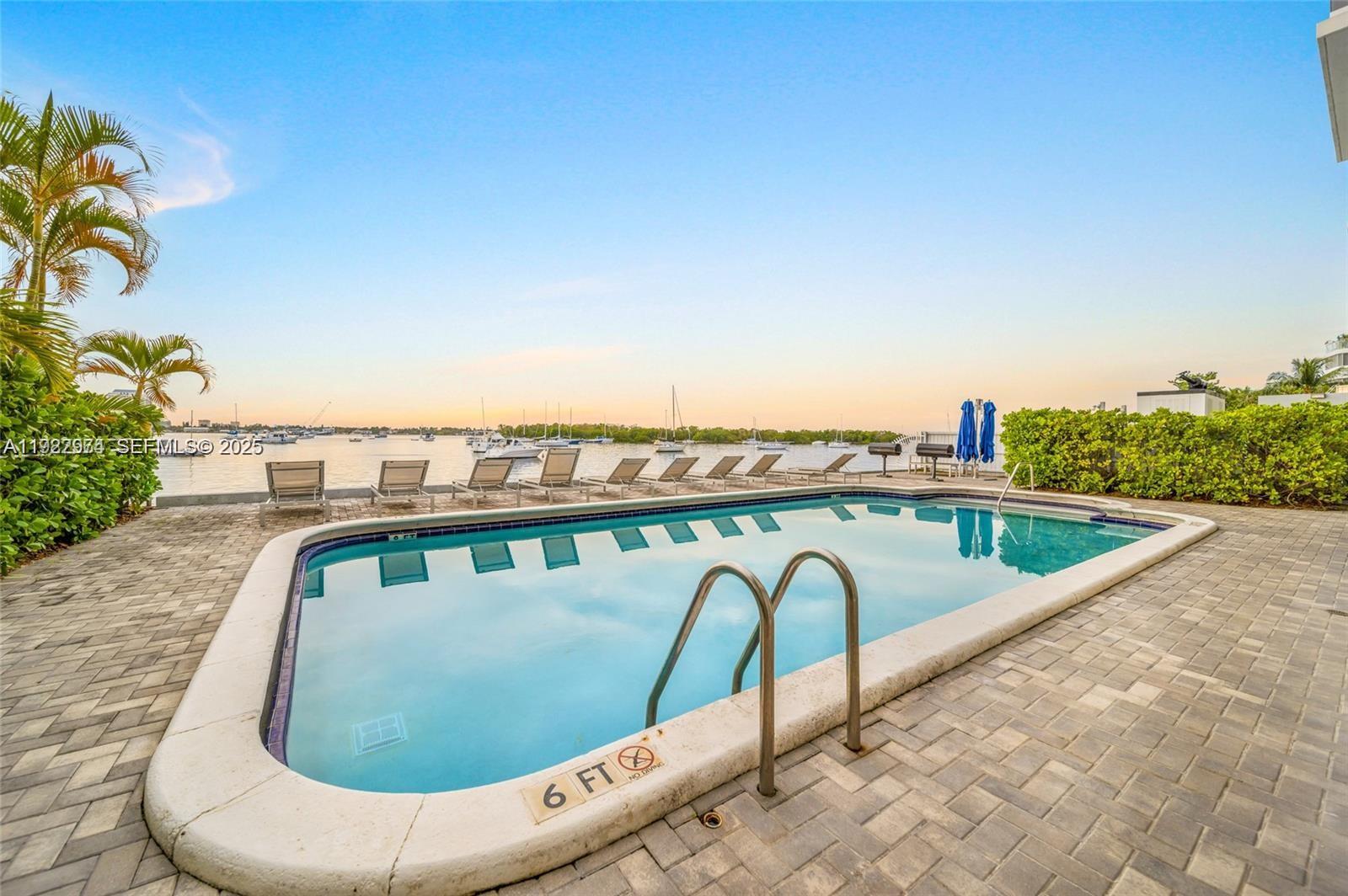 7928 West Drive, Unit 602 North Bay Village, FL 33141 - Photo 29 of 44 a view of swimming pool with a balcony