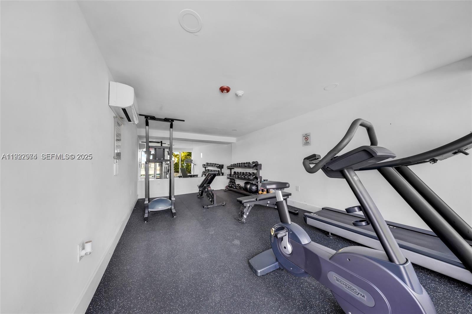 7928 West Drive, Unit 602 North Bay Village, FL 33141 - Photo 34 of 44 a view of a room with gym equipment
