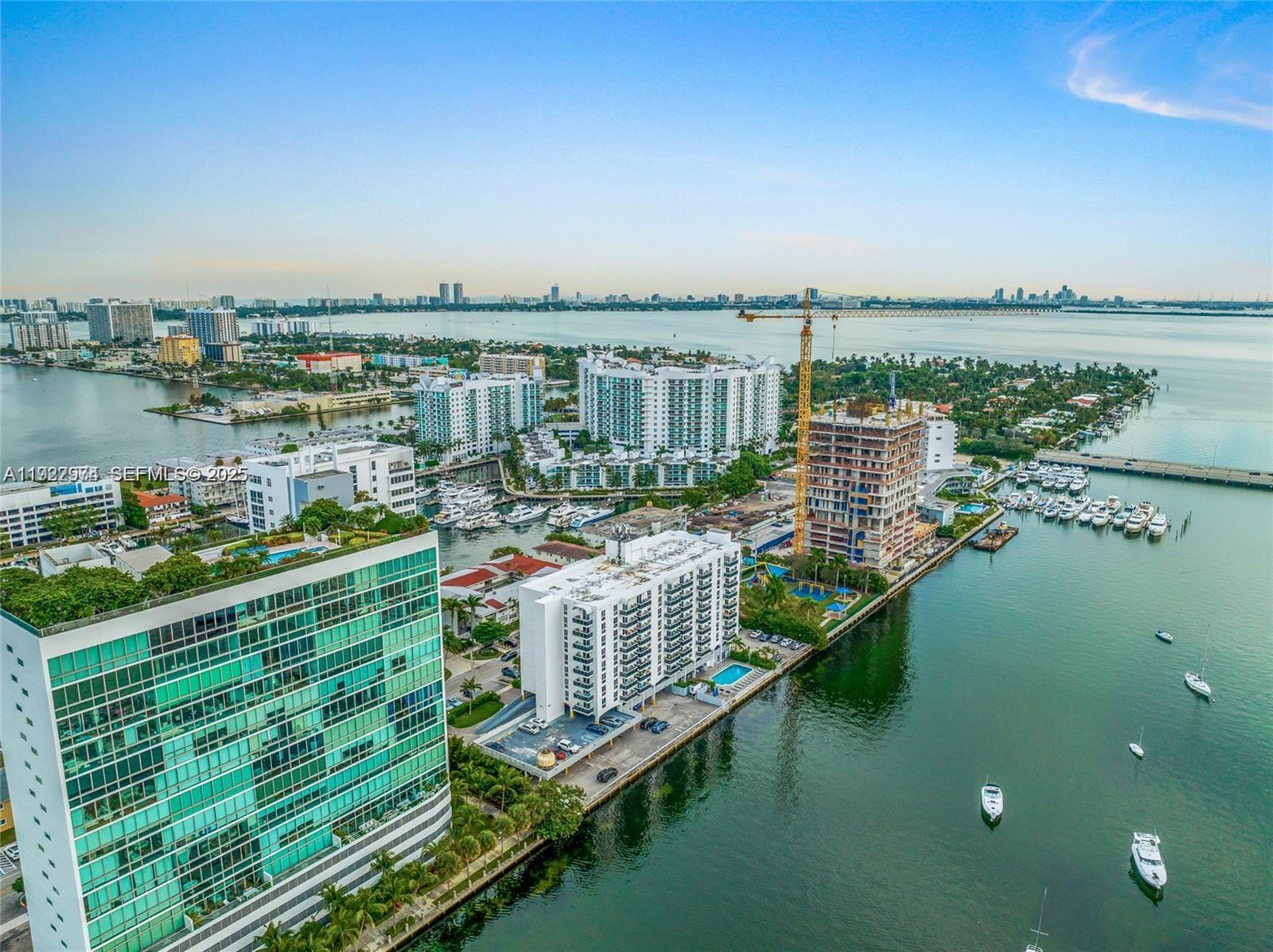 7928 West Drive, Unit 602 North Bay Village, FL 33141 - Photo 42 of 44 a view of a lake with a city