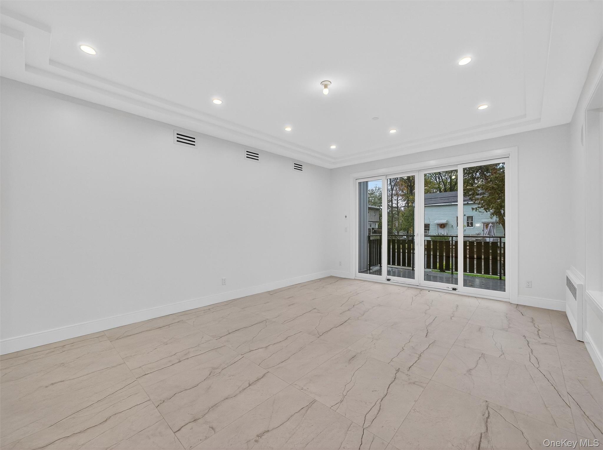 22 Johnson Street Spring Valley, NY 10977 - Photo 11 of 50 a view of an empty room with a window
