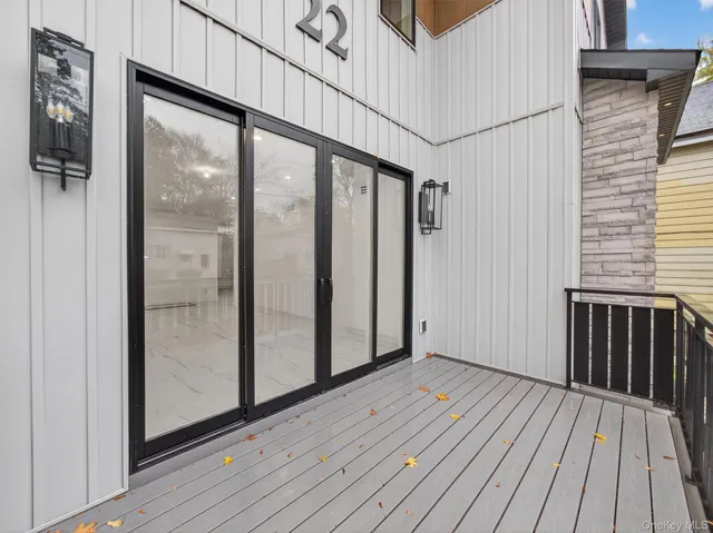 a view of wooden floor with a balcony