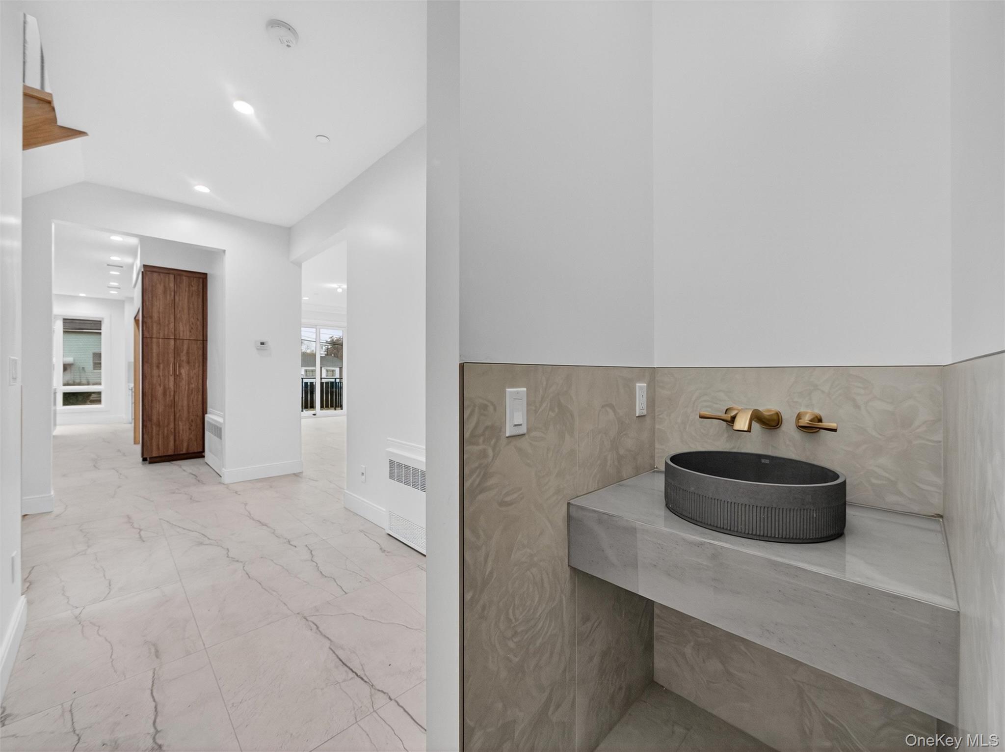 22 Johnson Street Spring Valley, NY 10977 - Photo 17 of 50 a view of a sink and cabinets