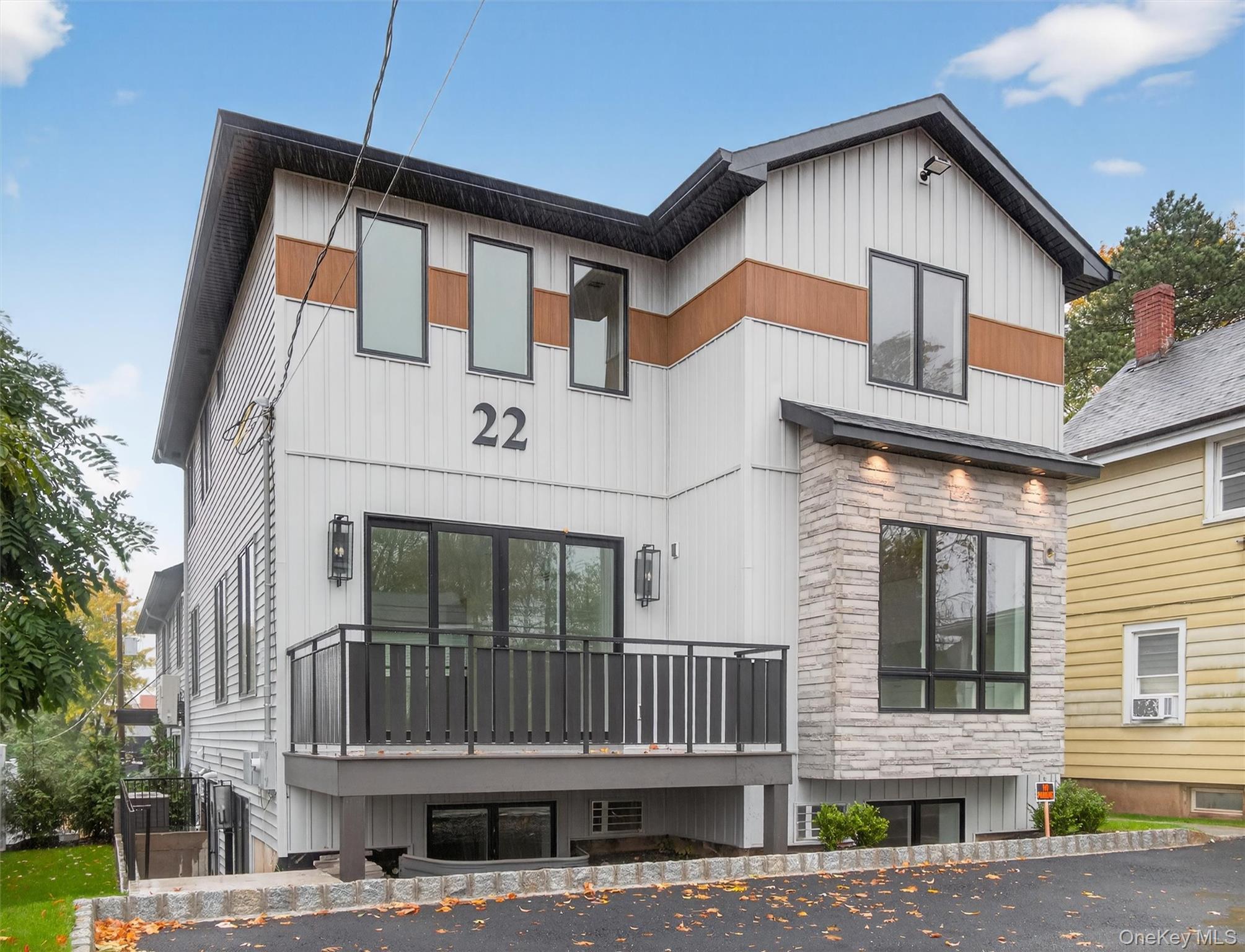 22 Johnson Street Spring Valley, NY 10977 - Photo 2 of 50 a front view of a house with balcony