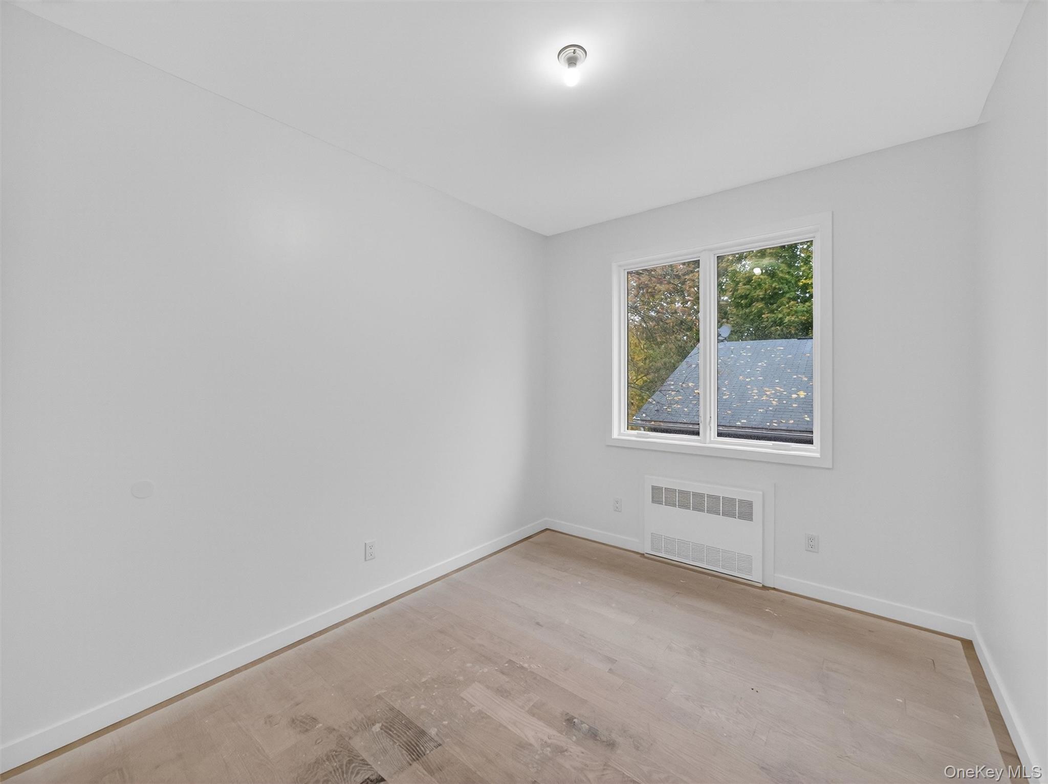 22 Johnson Street Spring Valley, NY 10977 - Photo 24 of 50 an empty room with windows