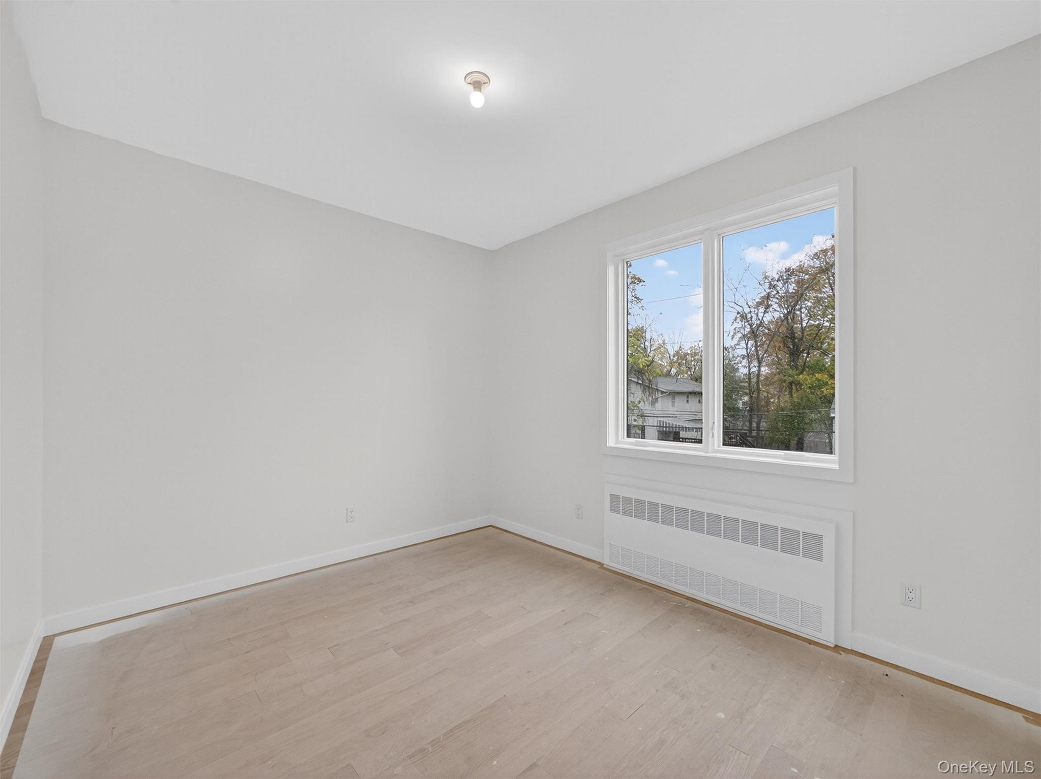 22 Johnson Street Spring Valley, NY 10977 - Photo 29 of 50 an empty room with a window