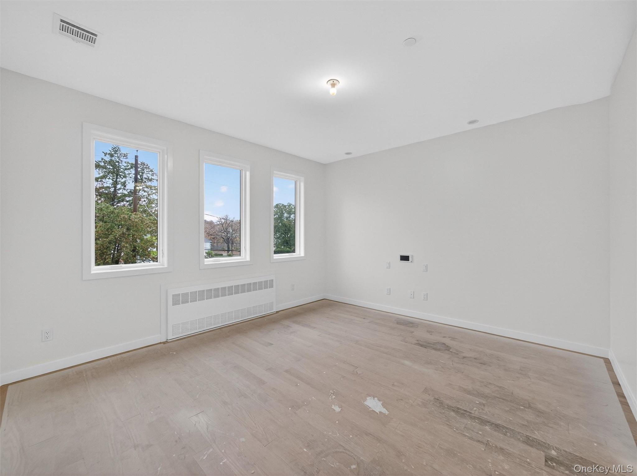 22 Johnson Street Spring Valley, NY 10977 - Photo 30 of 50 an empty room with windows