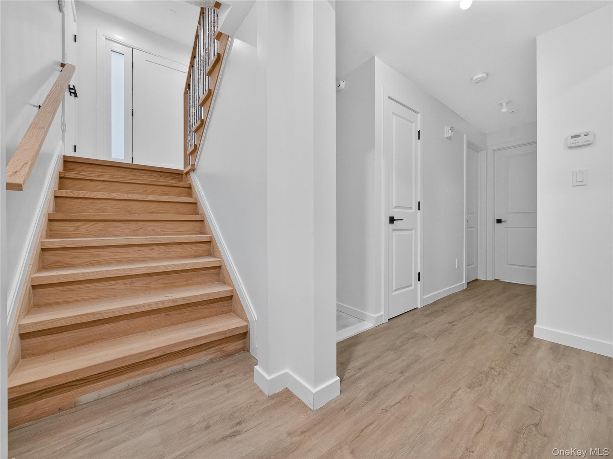22 Johnson Street Spring Valley, NY 10977 - Photo 43 of 50 a view of entryway with wooden floor