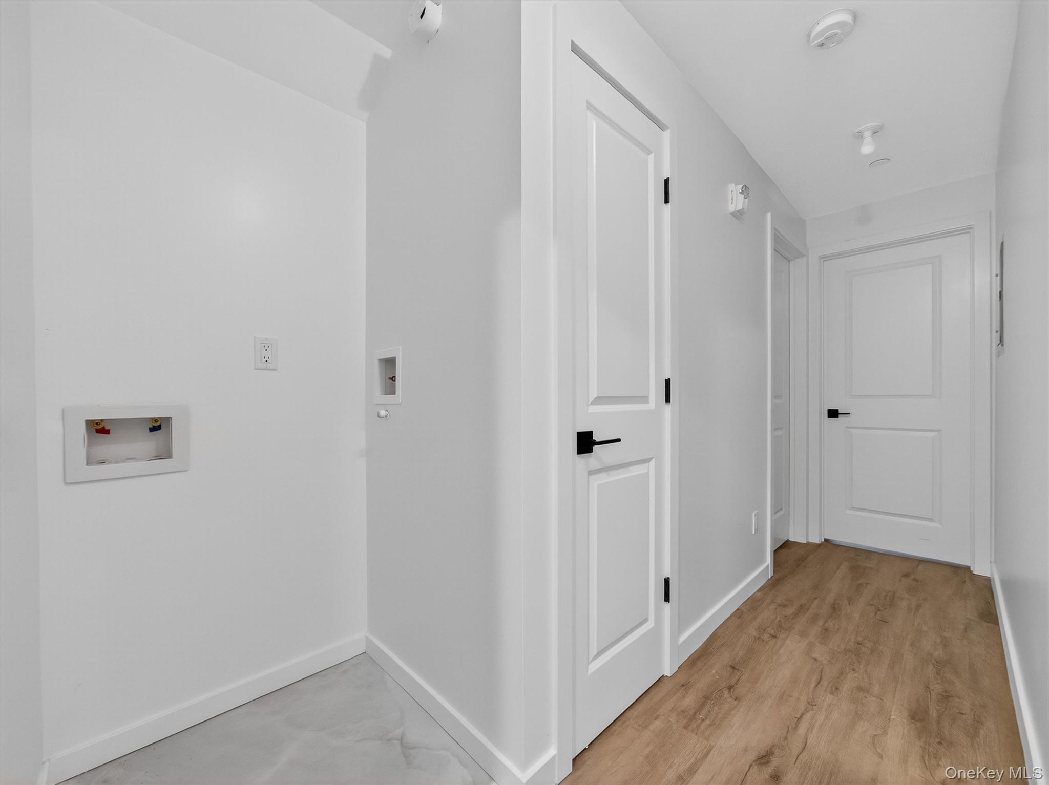 22 Johnson Street Spring Valley, NY 10977 - Photo 44 of 50 a view of a hallway with wooden floor