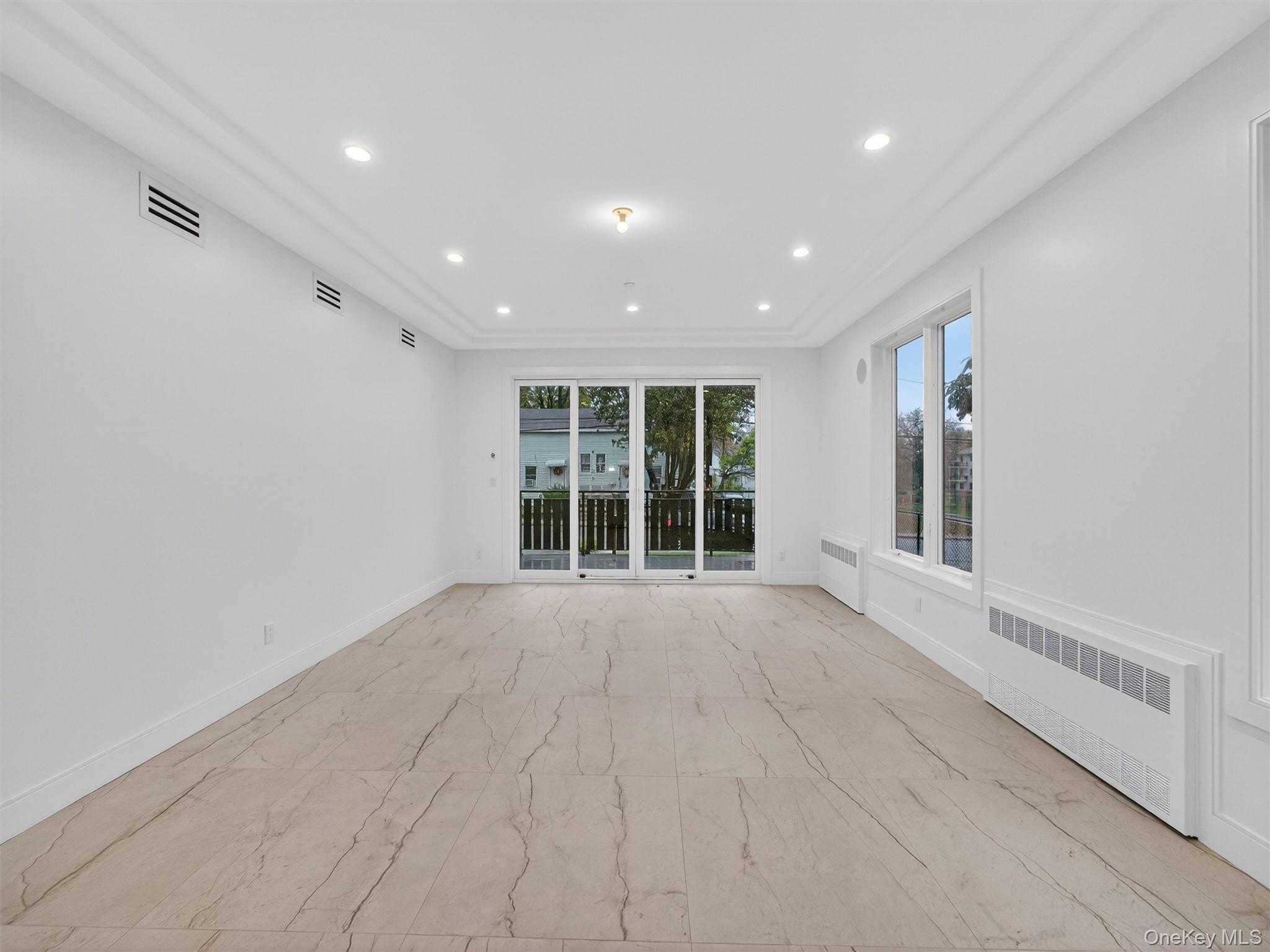 22 Johnson Street Spring Valley, NY 10977 - Photo 9 of 50 a view of an empty room with a window