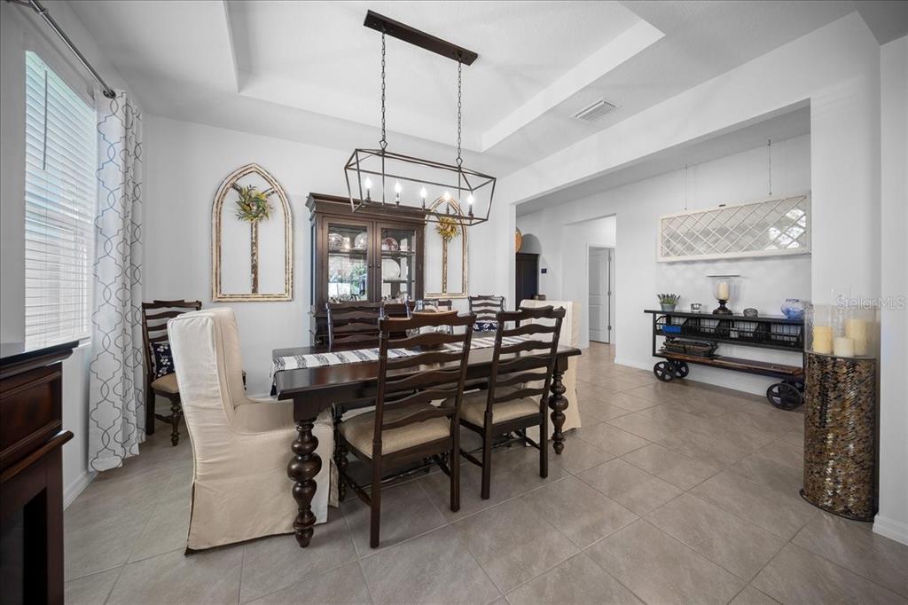 8598 Southwest 59th Terrace Ocala, FL 34476 - Photo 26 of 73 a view of a dining room with furniture