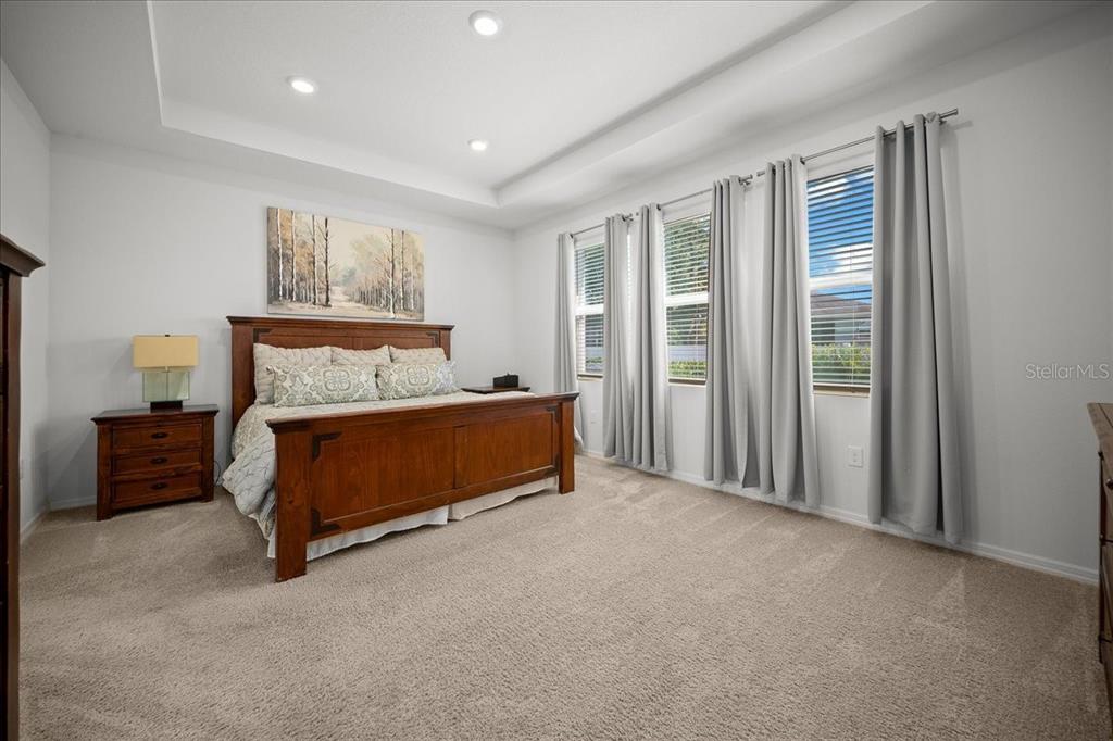 8598 Southwest 59th Terrace Ocala, FL 34476 - Photo 35 of 73 a bedroom with a bed and a window