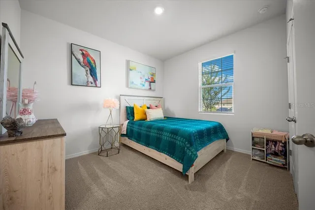 an aerial view of a house with a ocean view