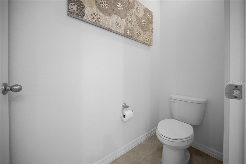 8598 Southwest 59th Terrace Ocala, FL 34476 - Photo 56 of 73 a white toilet sitting next to a white wall