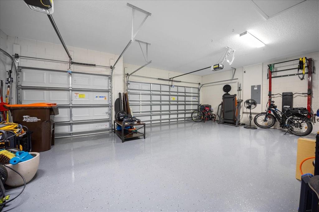 8598 Southwest 59th Terrace Ocala, FL 34476 - Photo 57 of 73 a view of a storage area with shoes and chairs