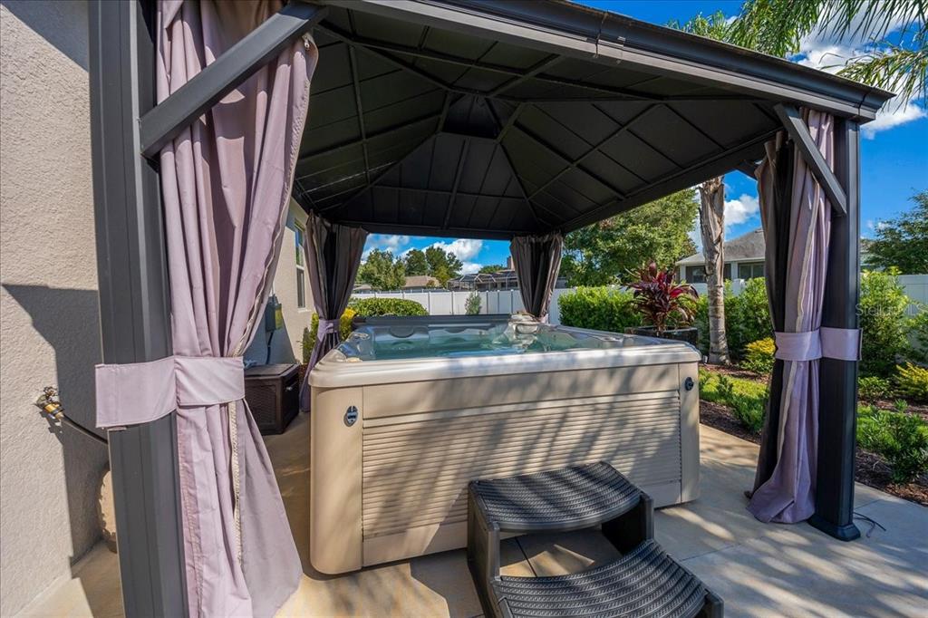 8598 Southwest 59th Terrace Ocala, FL 34476 - Photo 62 of 73 a view of outdoor sitting area with furniture and wooden floor