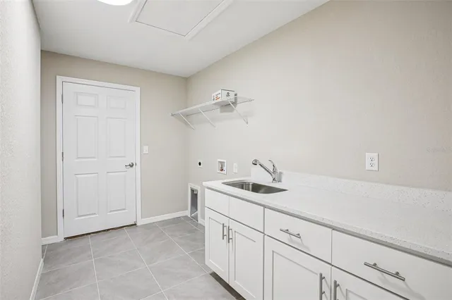 a bathroom with a sink and vanity