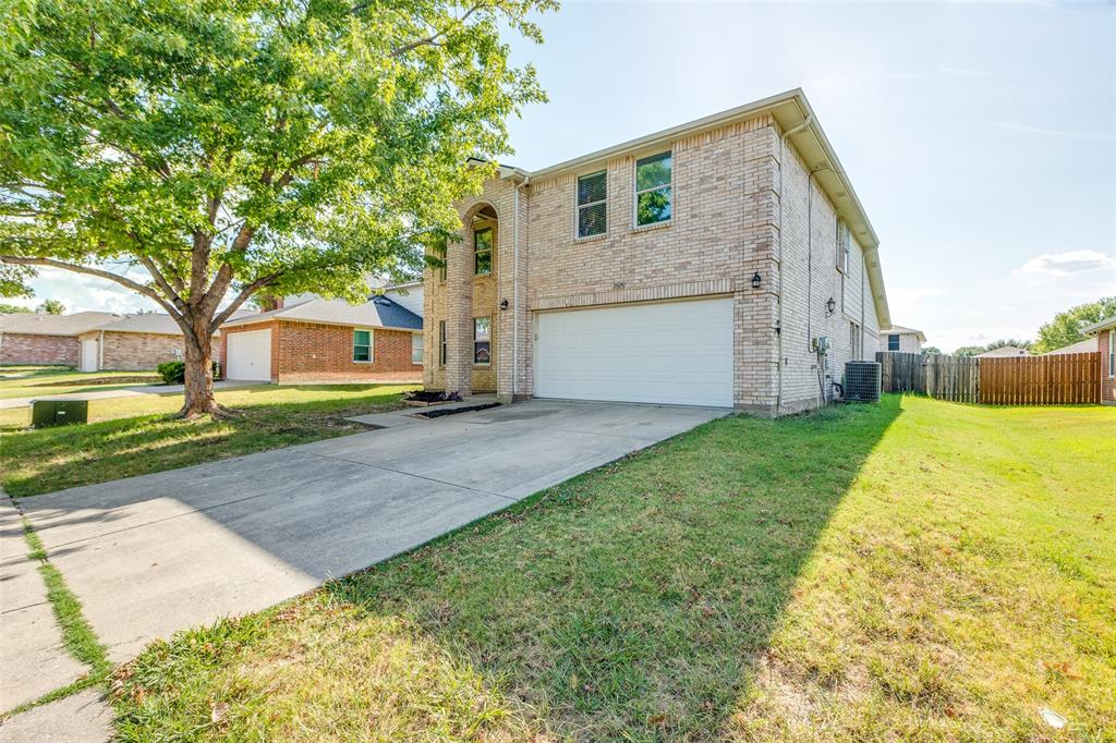 2624 Misty Harbor Drive Little Elm, TX 75068 - Photo 1 of 25 a view of a house with a yard