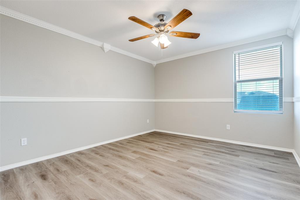 2624 Misty Harbor Drive Little Elm, TX 75068 - Photo 20 of 25 an empty room with a window and a ceiling fan