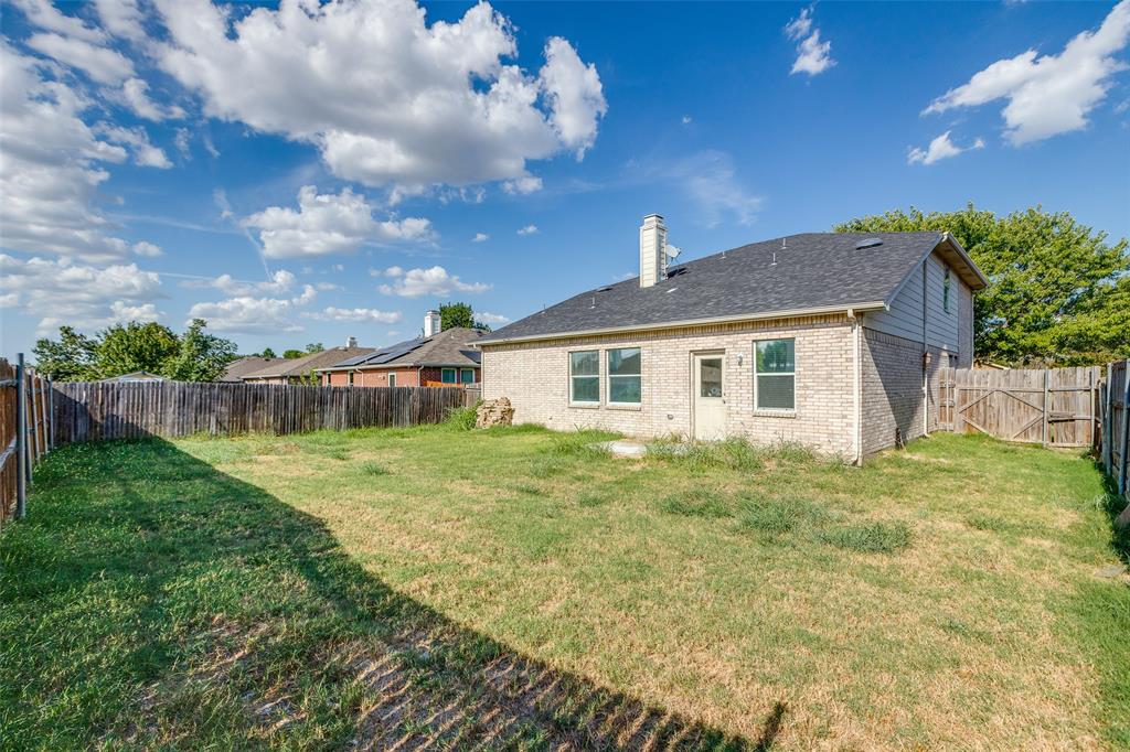 2624 Misty Harbor Drive Little Elm, TX 75068 - Photo 25 of 25 a view of a house with a backyard