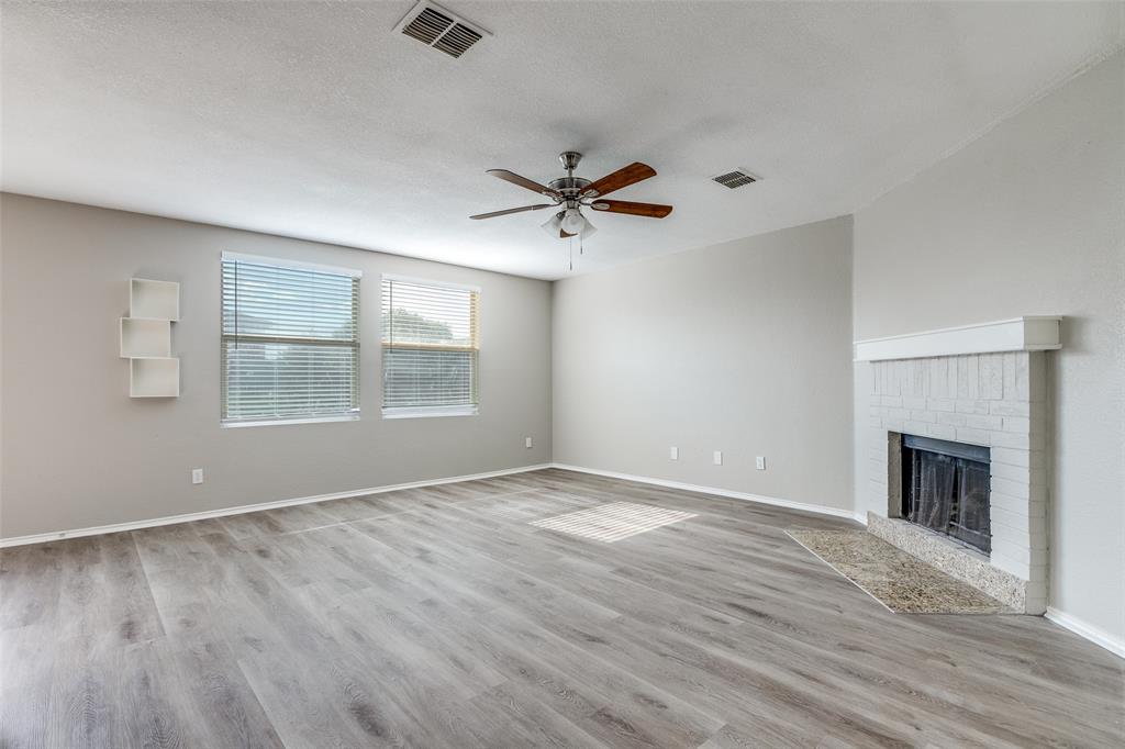 2624 Misty Harbor Drive Little Elm, TX 75068 - Photo 5 of 25 an empty room with fan and windows