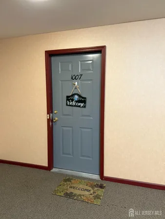 a view of a hallway with closet
