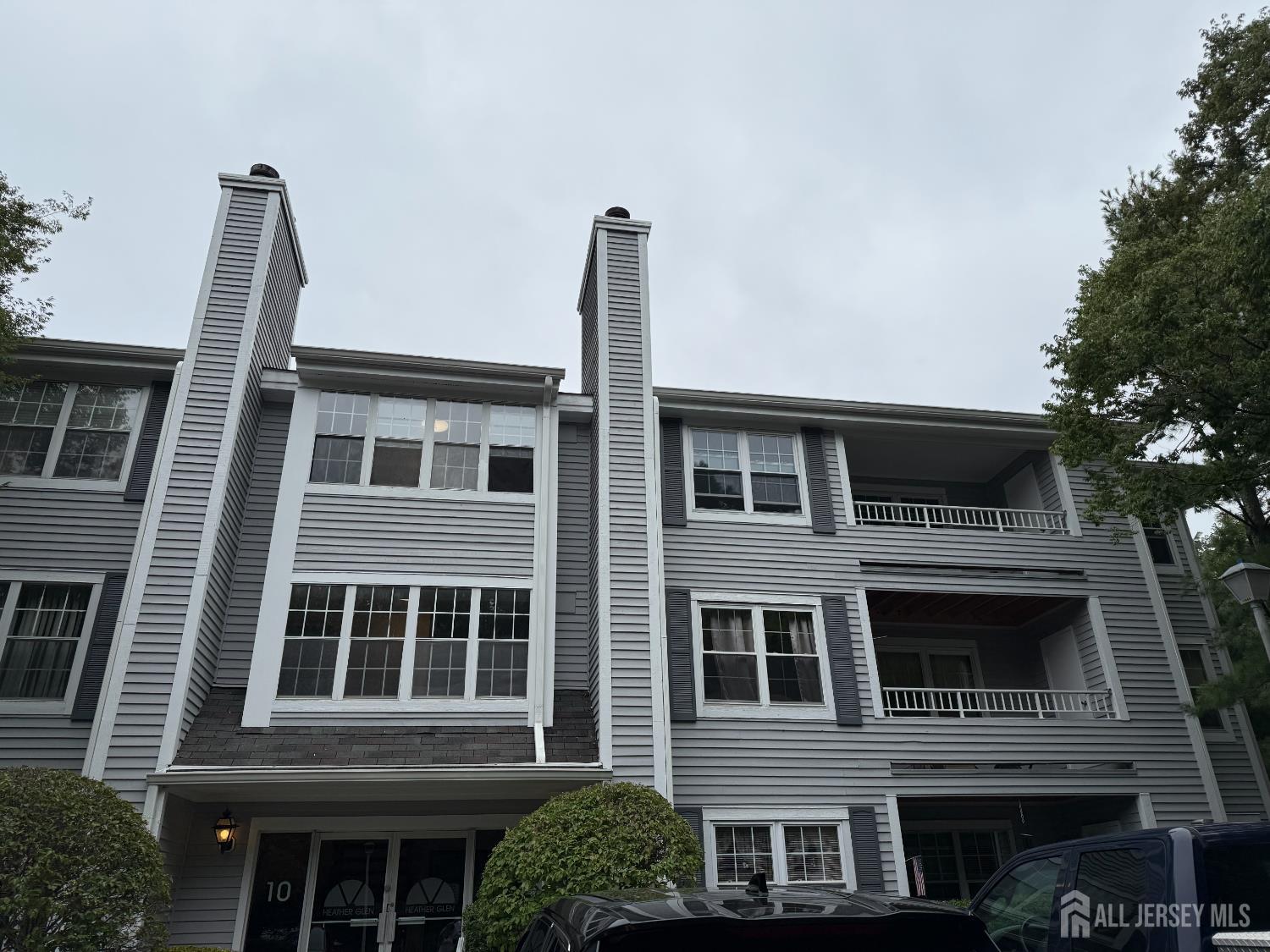 1007 Meadow Court Helmetta, NJ 08828 - Photo 3 of 4 a front view of a house with a yard