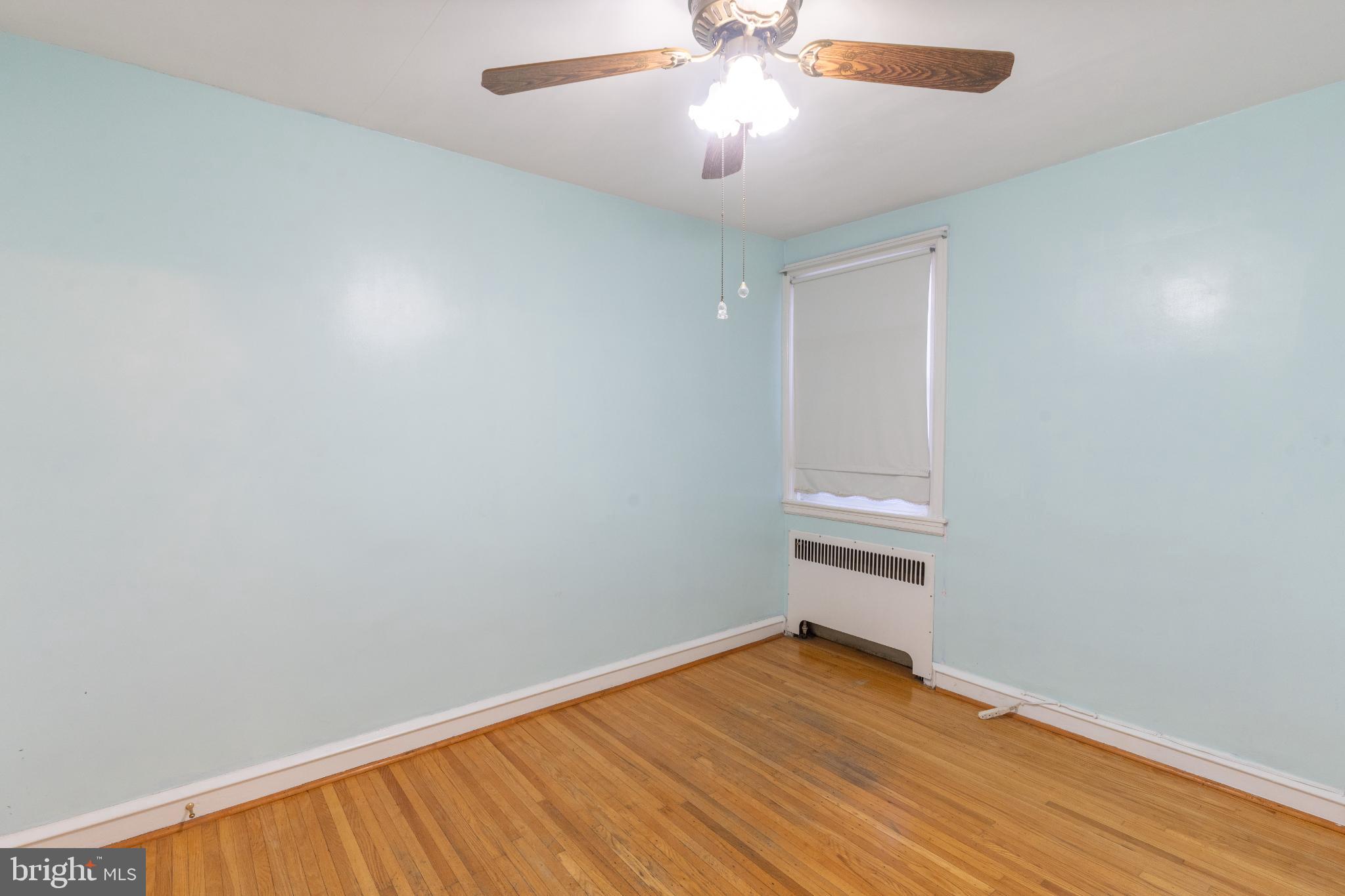 6755 Rutland Street Philadelphia, PA 19149 - Photo 11 of 21 Bright and airy room with wooden floors.
