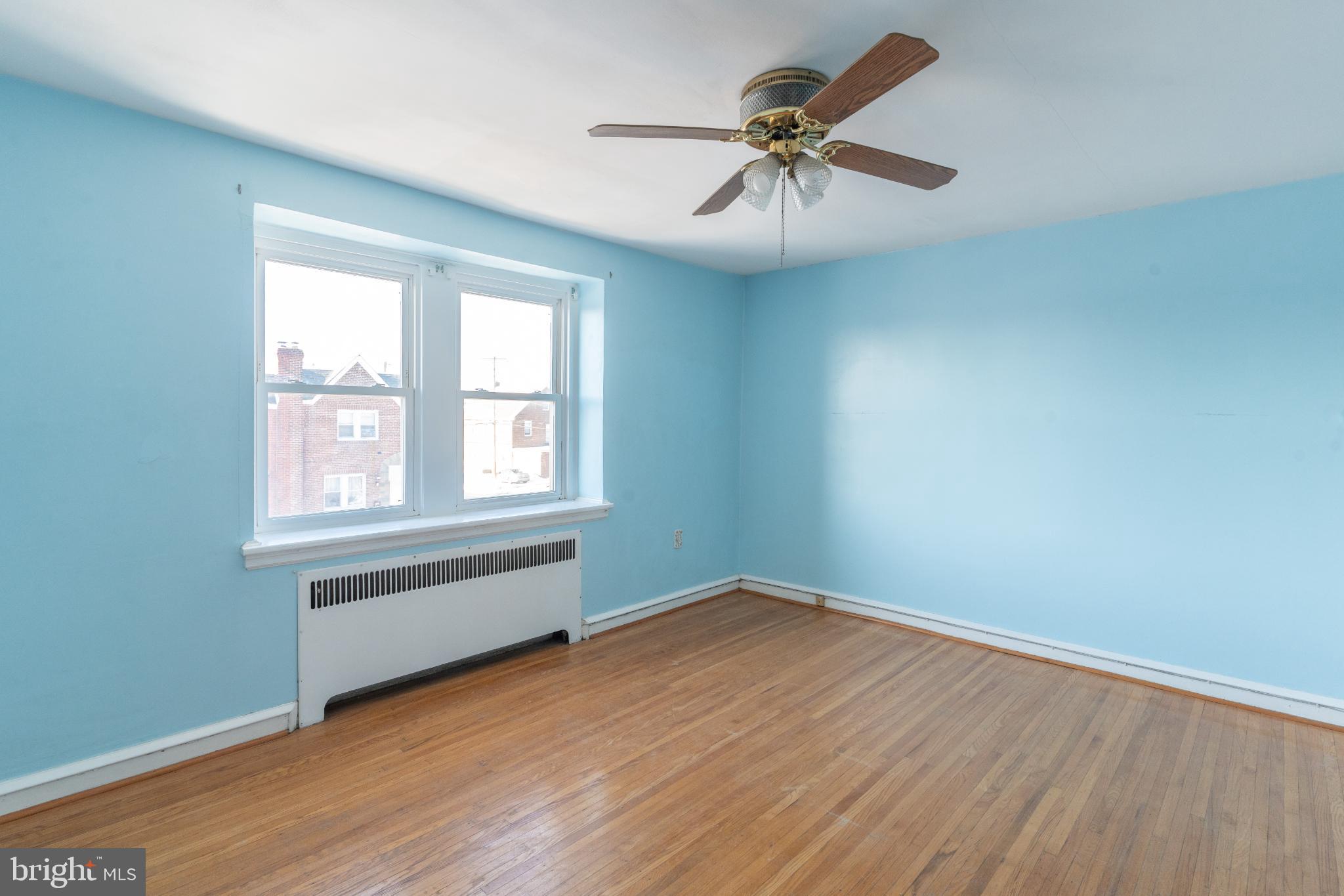6755 Rutland Street Philadelphia, PA 19149 - Photo 12 of 21 Bright and airy room with serene blue walls.