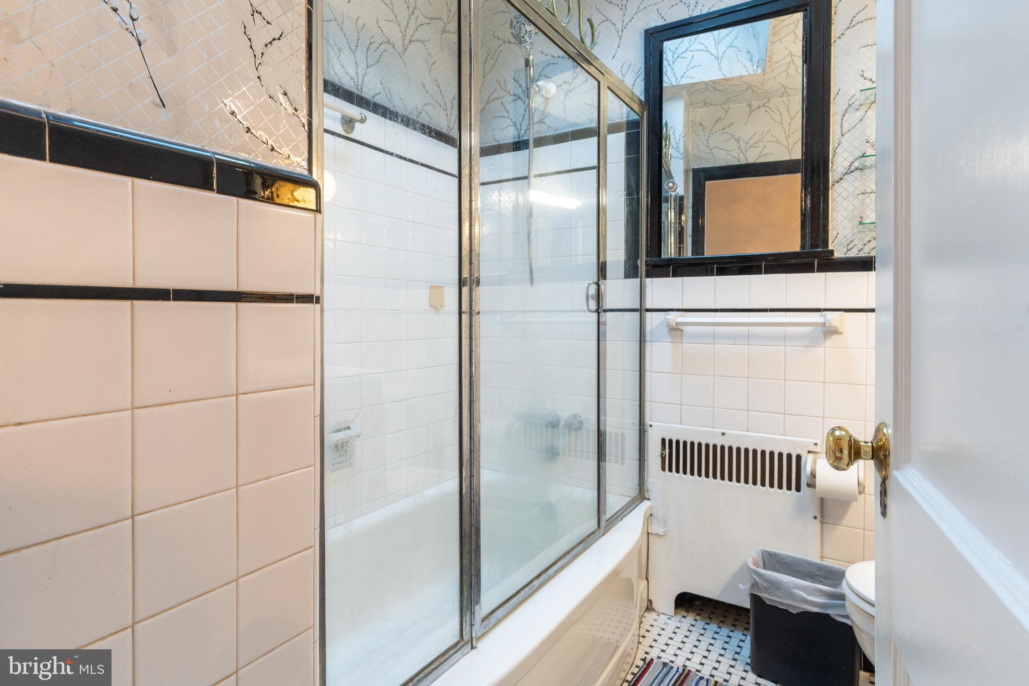 6755 Rutland Street Philadelphia, PA 19149 - Photo 15 of 21 Charming bathroom with vintage tile accents.
