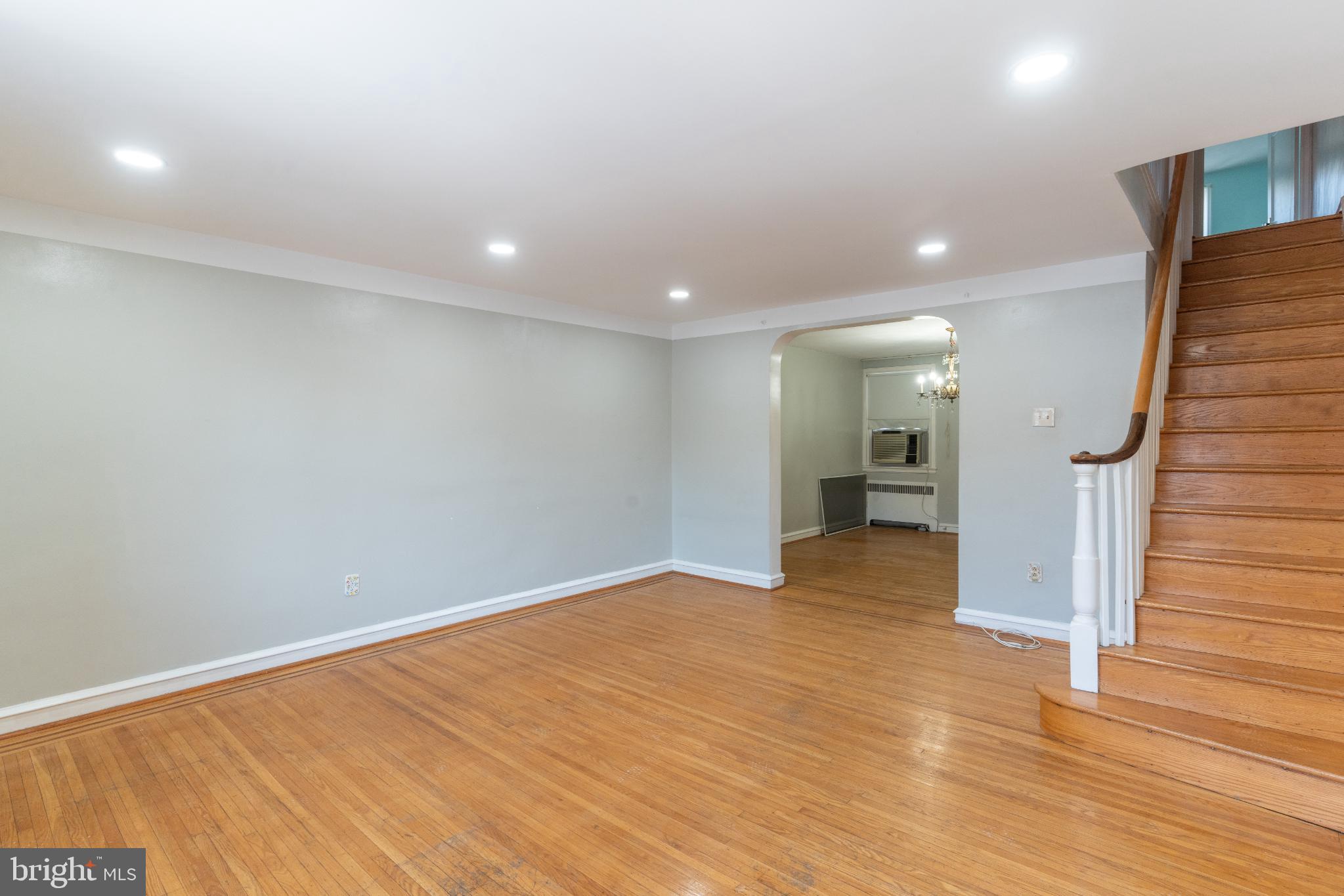 Spacious living area with warm wood accents.